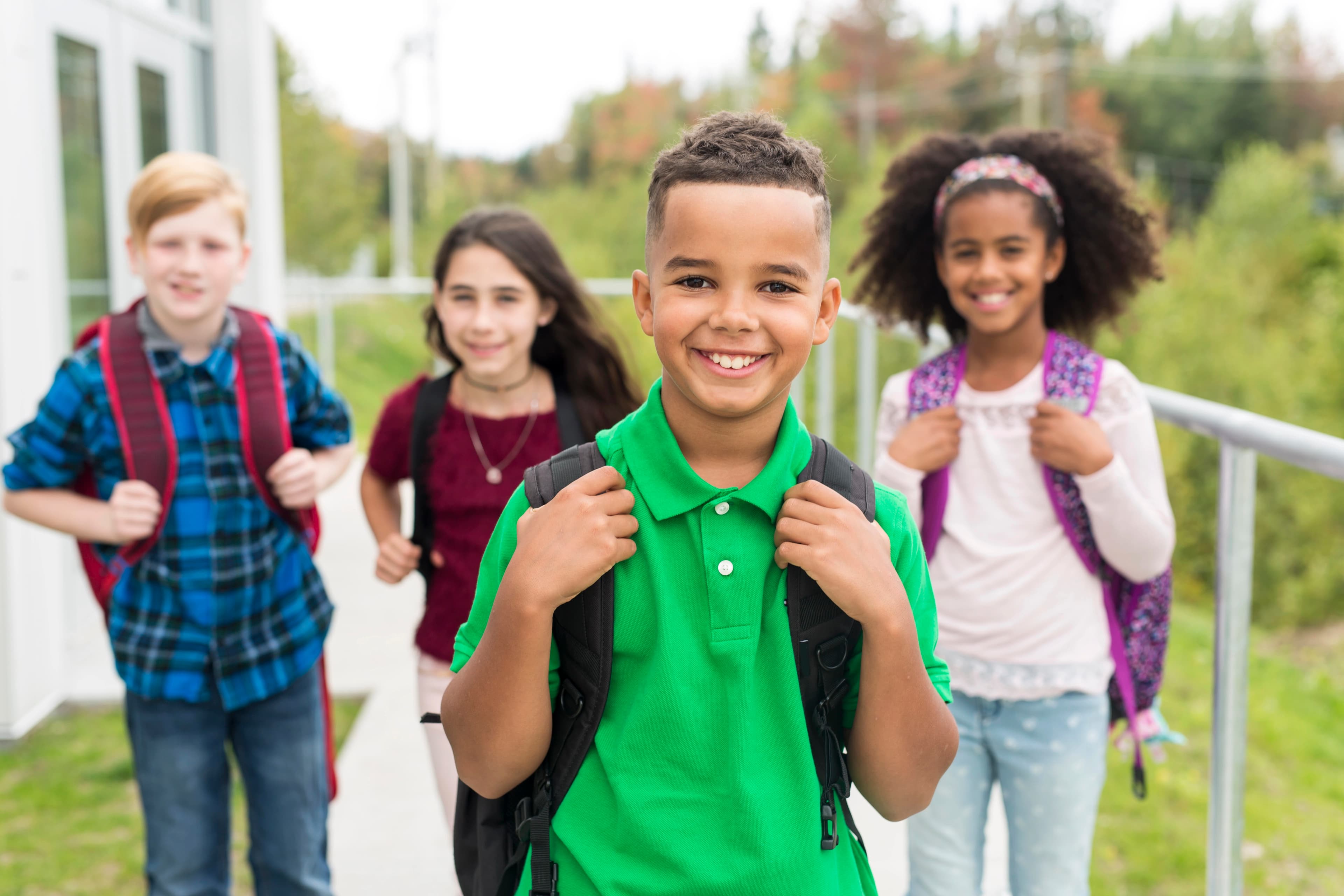 Children practicing social skills together in class